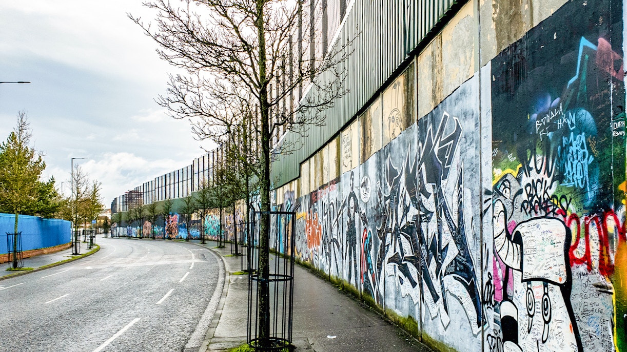 Solidarity Wall in Belfast featuring colorful murals promoting peace and unity.