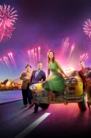 Guys & Dolls cast on a taxi with Sydney Harbour fireworks and skyline backdrop