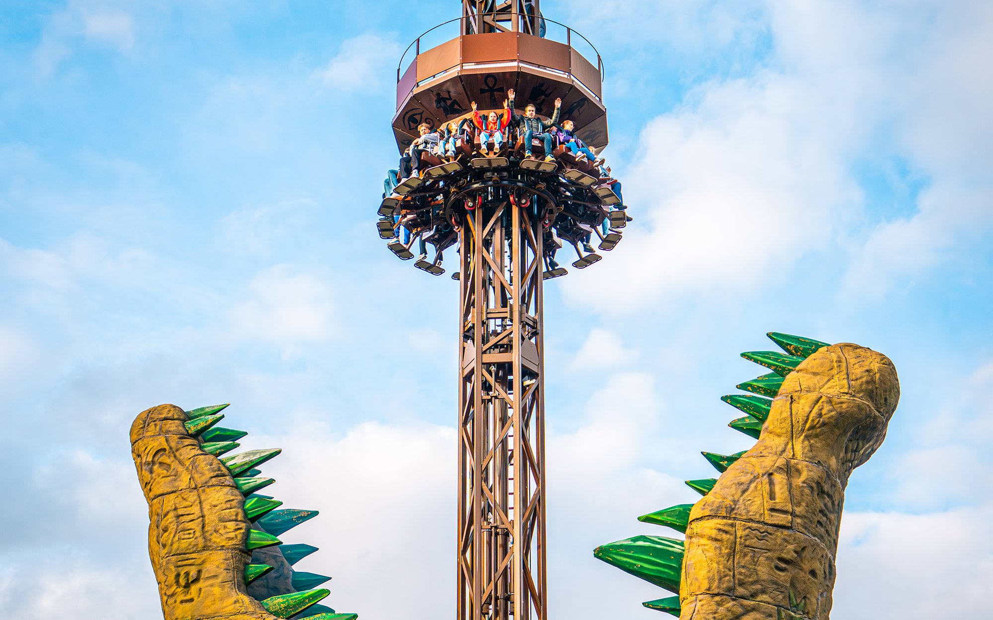 Croc Drop ride at Chessington World of Adventures, featuring a drop tower with riders descending.