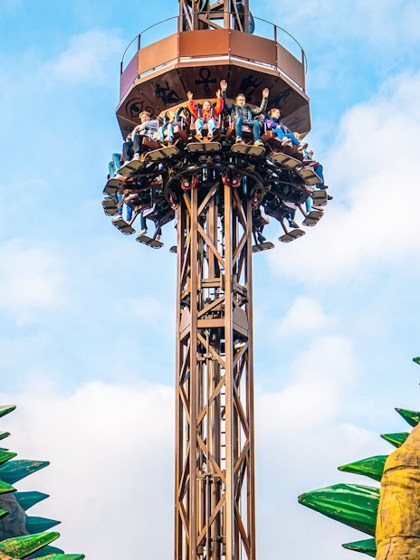 Croc Drop ride at Chessington World of Adventures, featuring a drop tower with riders descending.