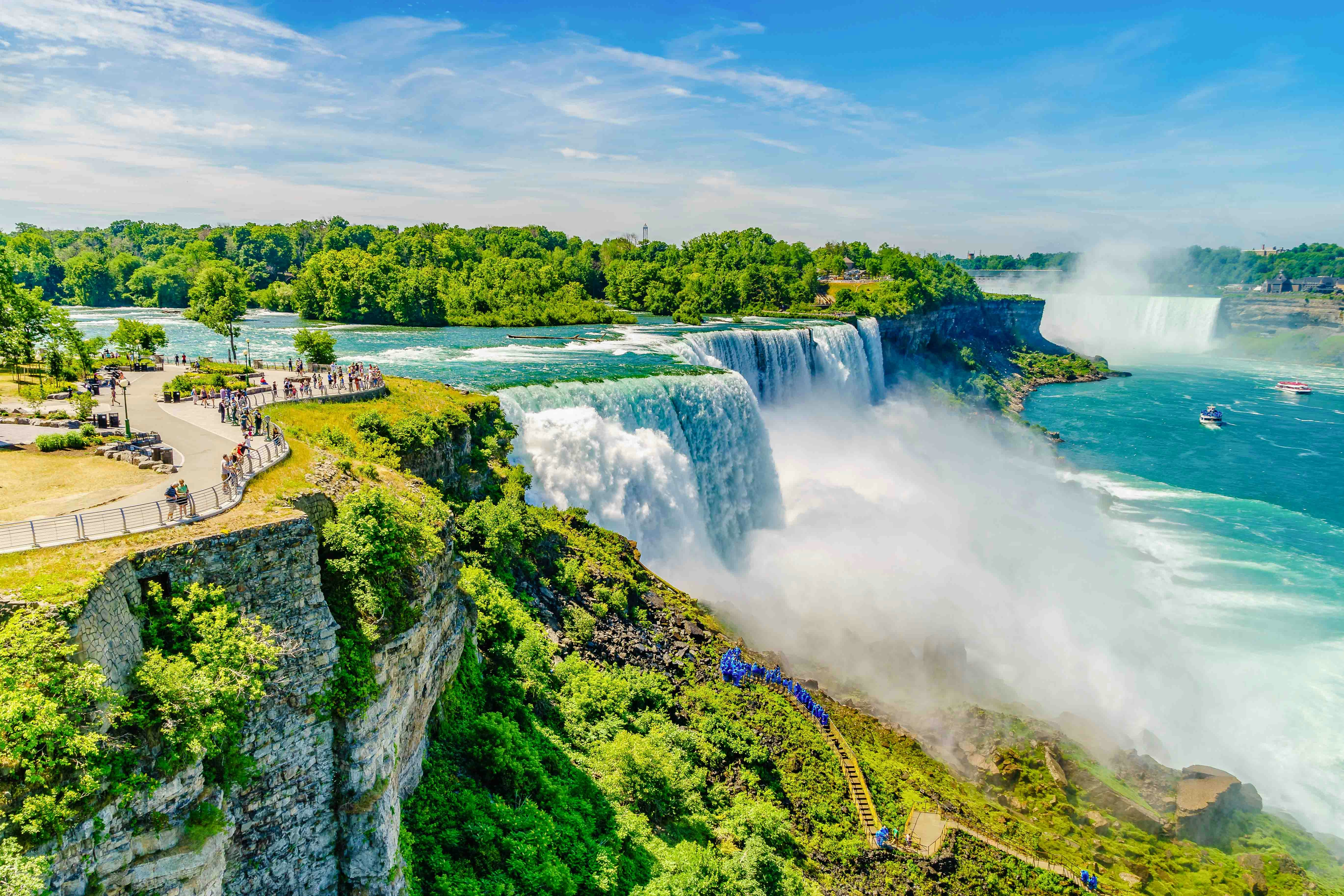 Niagara Falls Canada with mist rising from cascading waterfalls.