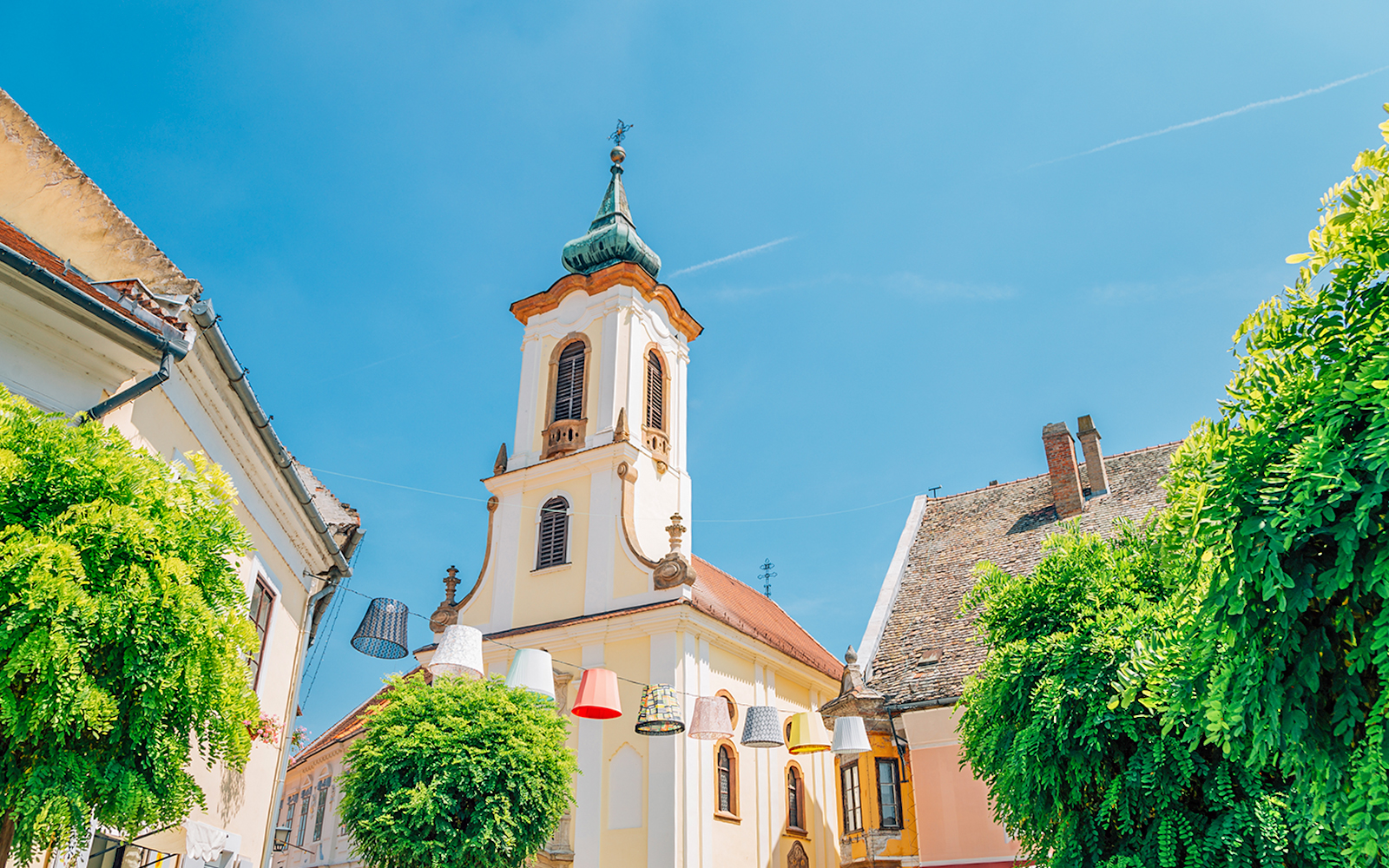 Blagovestenska Church tower in Szentendre's medieval old town main square, Hungary.