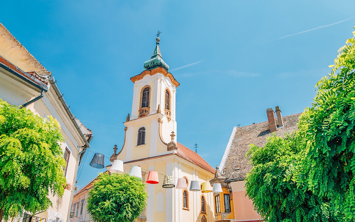 Blagovestenska Church tower in Szentendre's medieval old town main square, Hungary.