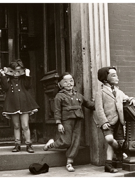 Children wearing masks on a stoop, part of the Women Photographers (1900-1975) exhibition at the National Gallery of Victoria.