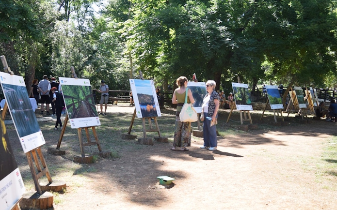 Visitors viewing outdoor exhibits at Krka National Park.