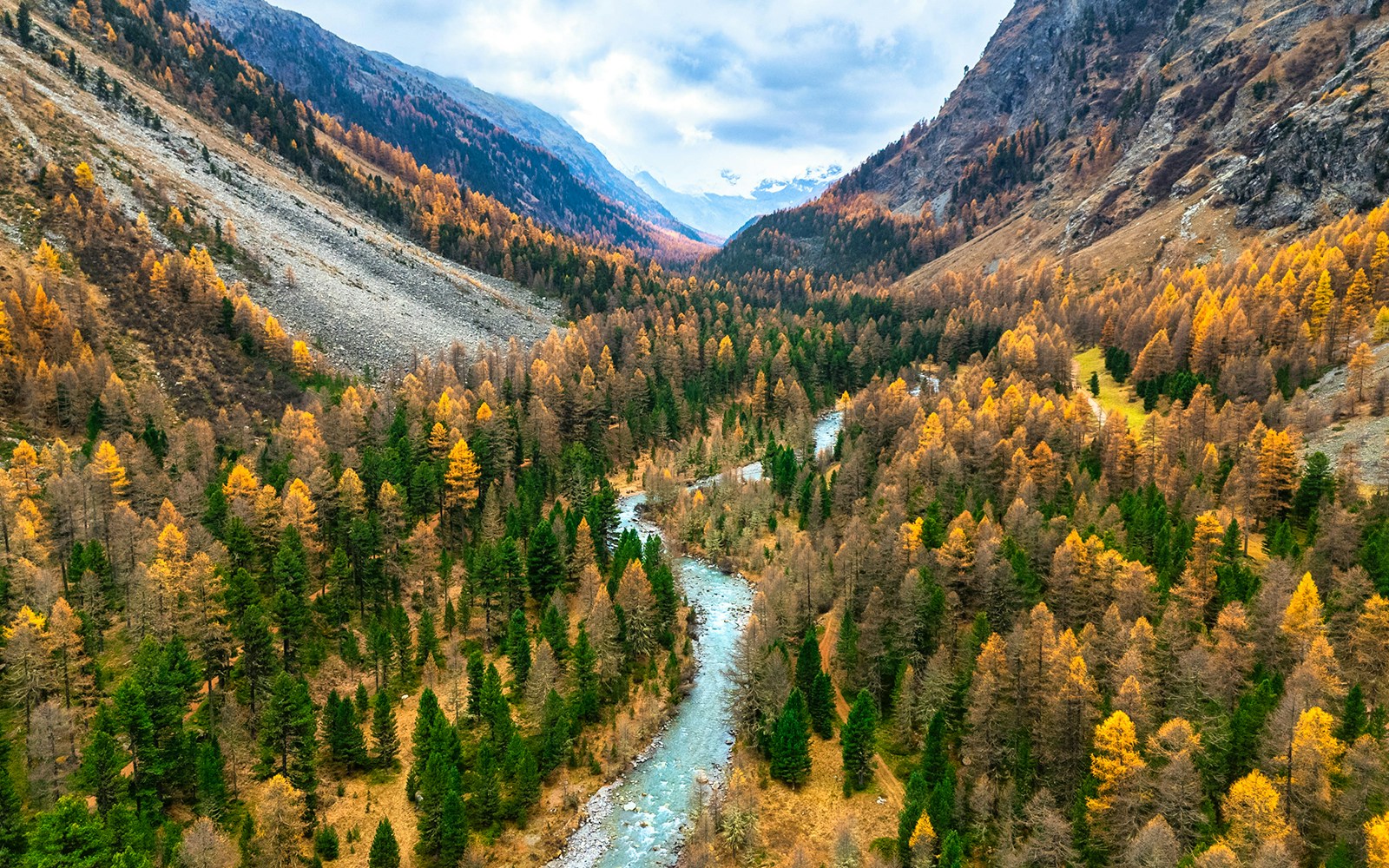 Aerial View of autumn Colors in Val Roseg with Turquoise River Swiss Alps, Pontresina,