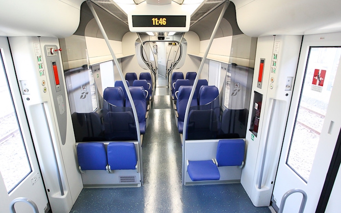 Comfortable seating in Leonardo Express train carriage.