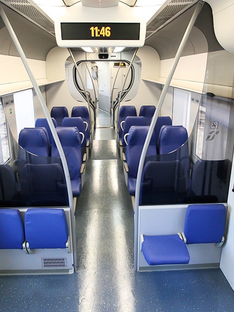 Comfortable seating in Leonardo Express train carriage.
