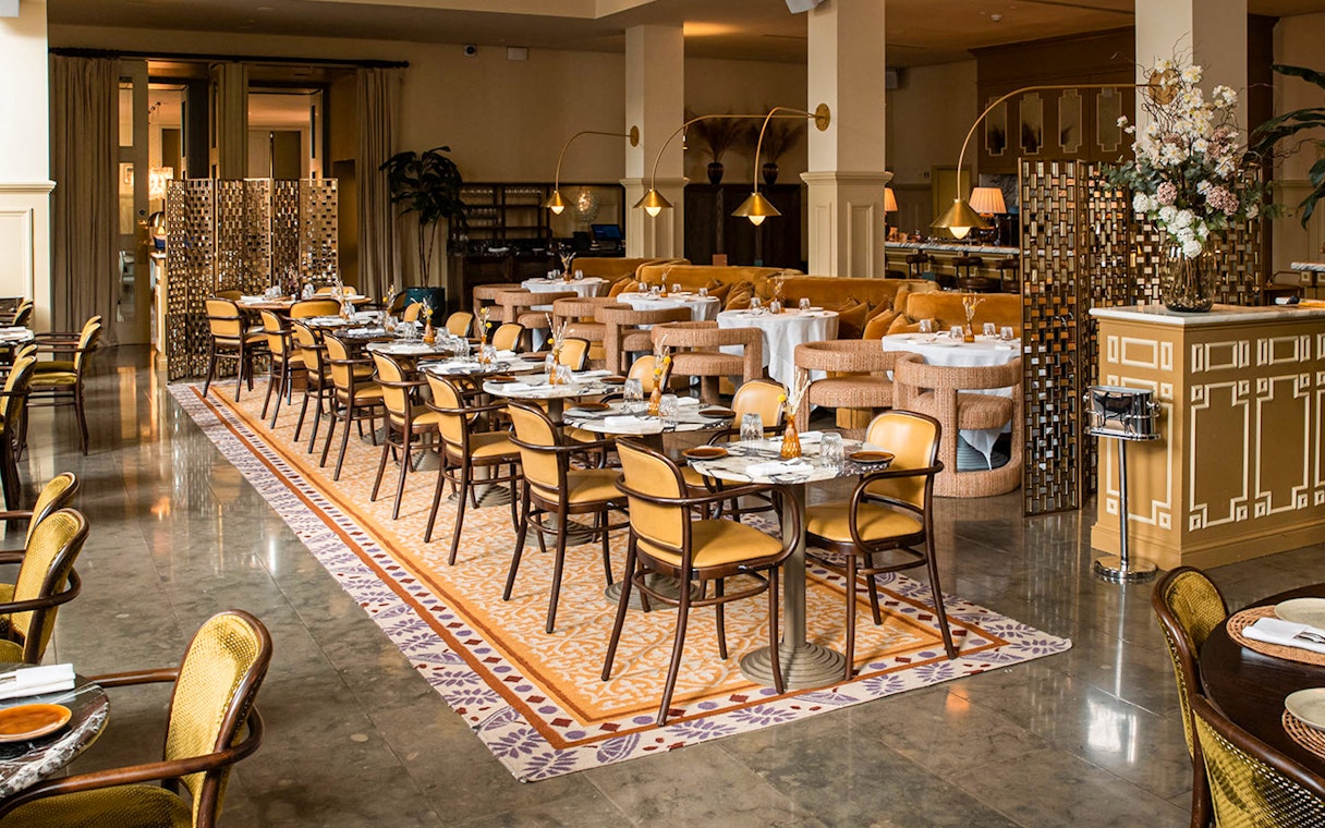Elegant dining area set for afternoon tea, part of the National Gallery Guided Tour experience.
