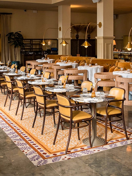 Elegant dining area set for afternoon tea, part of the National Gallery Guided Tour experience.