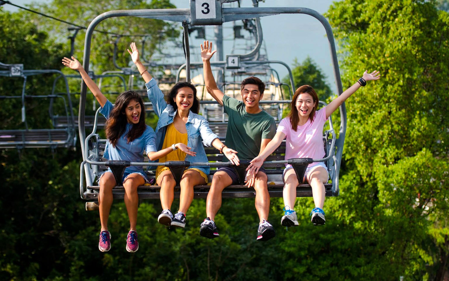 Friends enjoying a ride at Skyline Luge Kuala Lumpur.