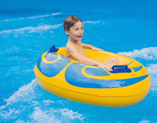 kid in wavepool of Aqualand