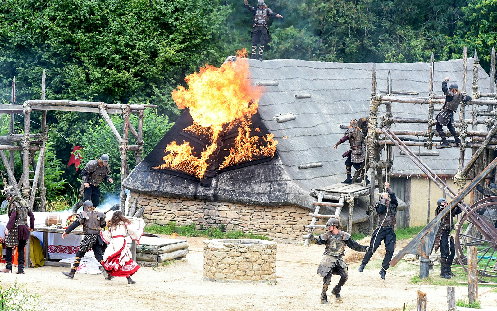 Viking reenactment at Puy du Fou, France, featuring actors in traditional costumes.