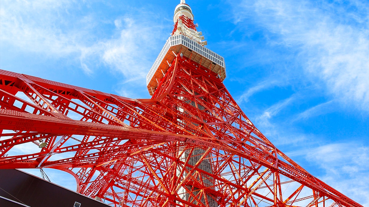 Tokyo Tower against blue sky, part of 24-hour Tokyo subway ticket combo.