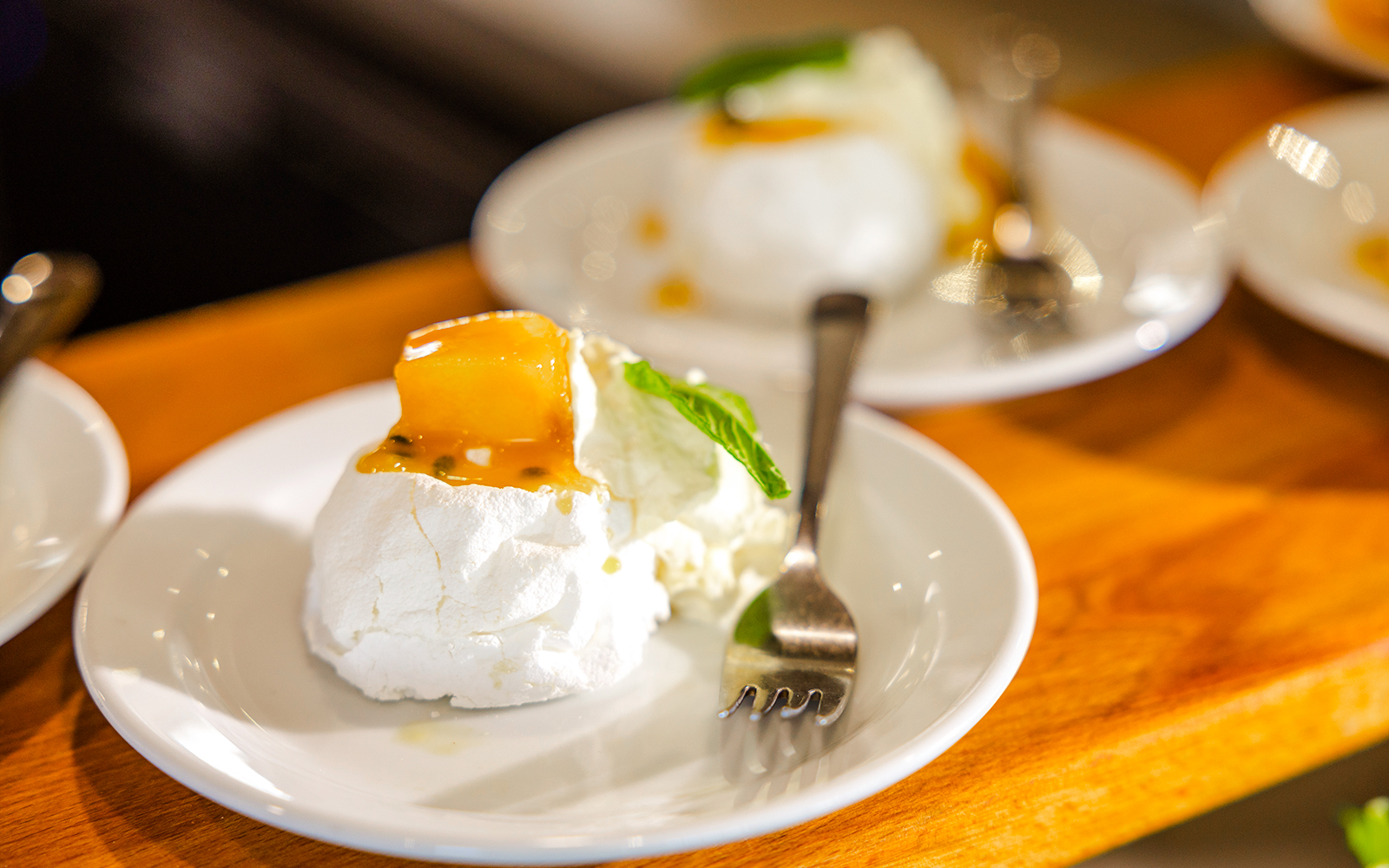 Pavlova dessert with fruit topping at Gold Coast buffet lunch.