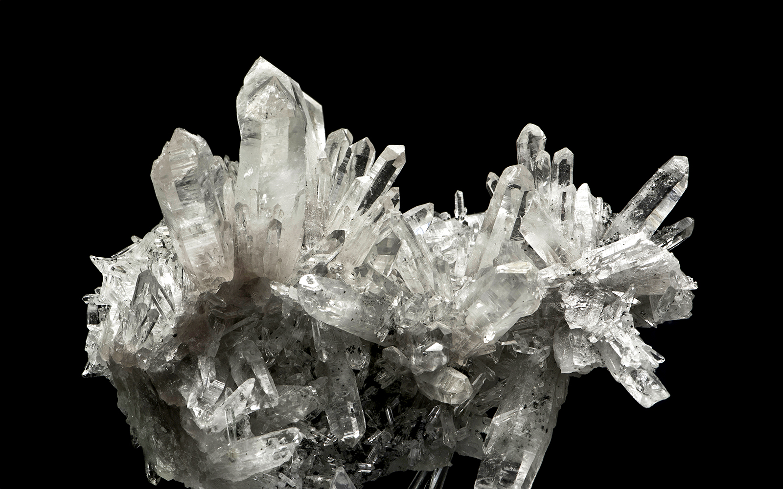 Quartz crystal cluster displayed in a museum exhibit.