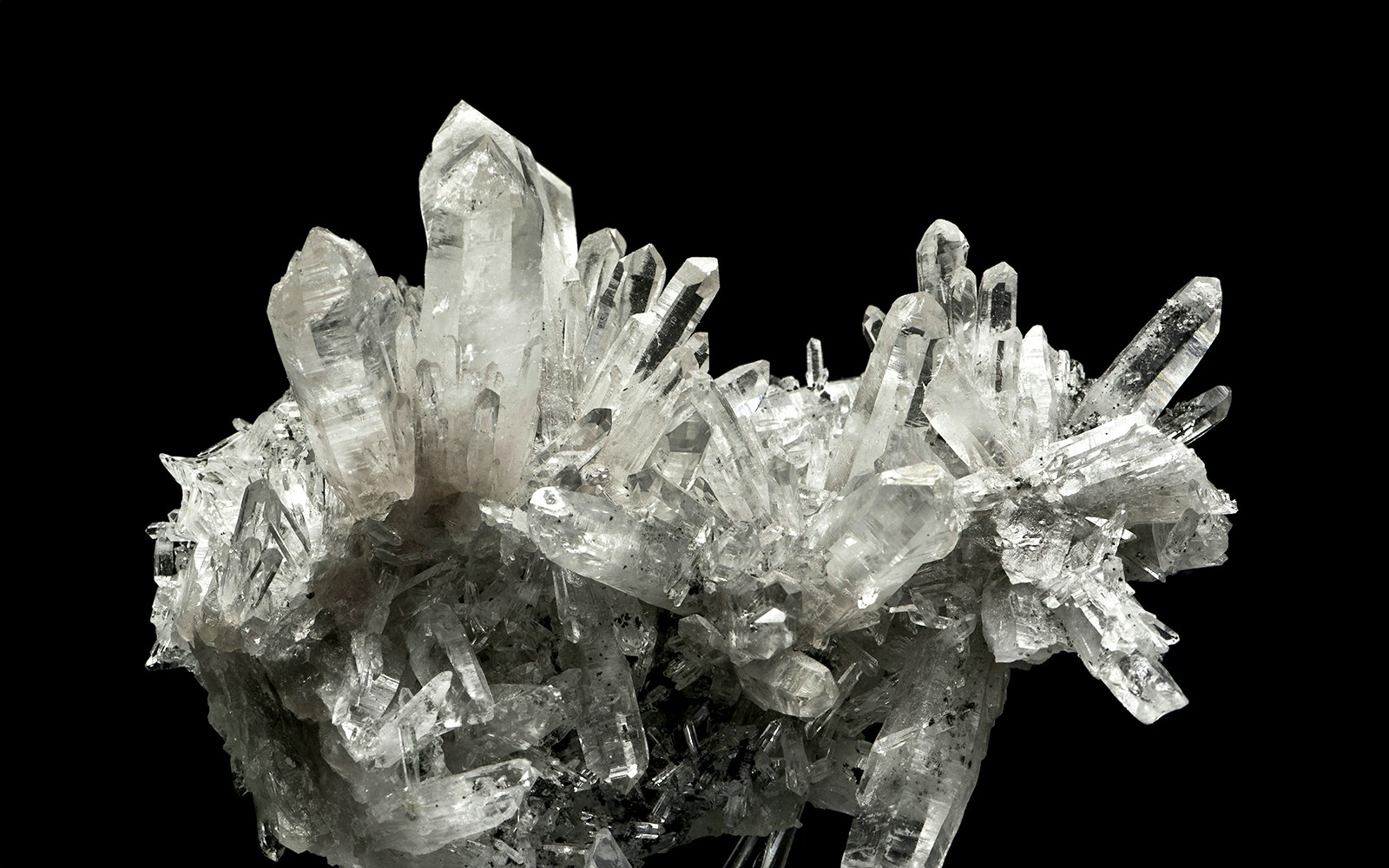 Quartz crystal cluster displayed in a museum exhibit.