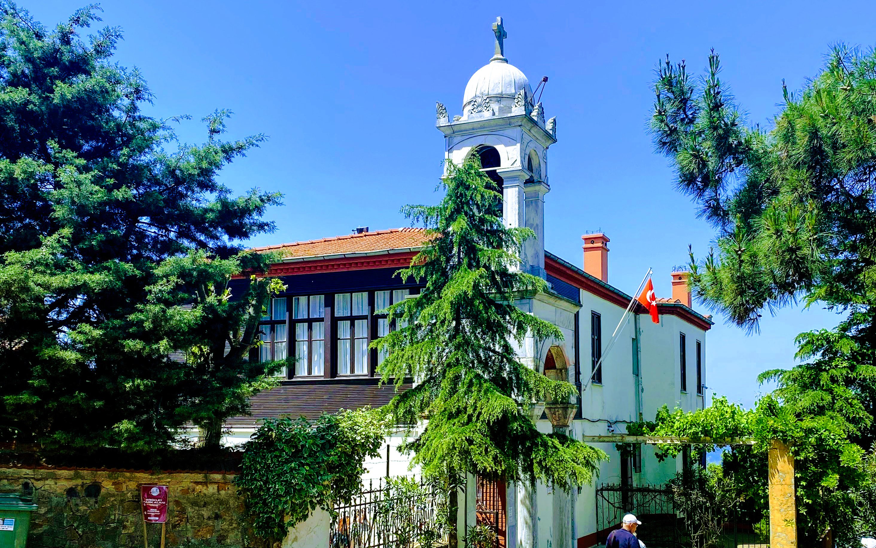 Aya Yorgi Church with bell tower and Turkish flag, Princes Island, Istanbul.