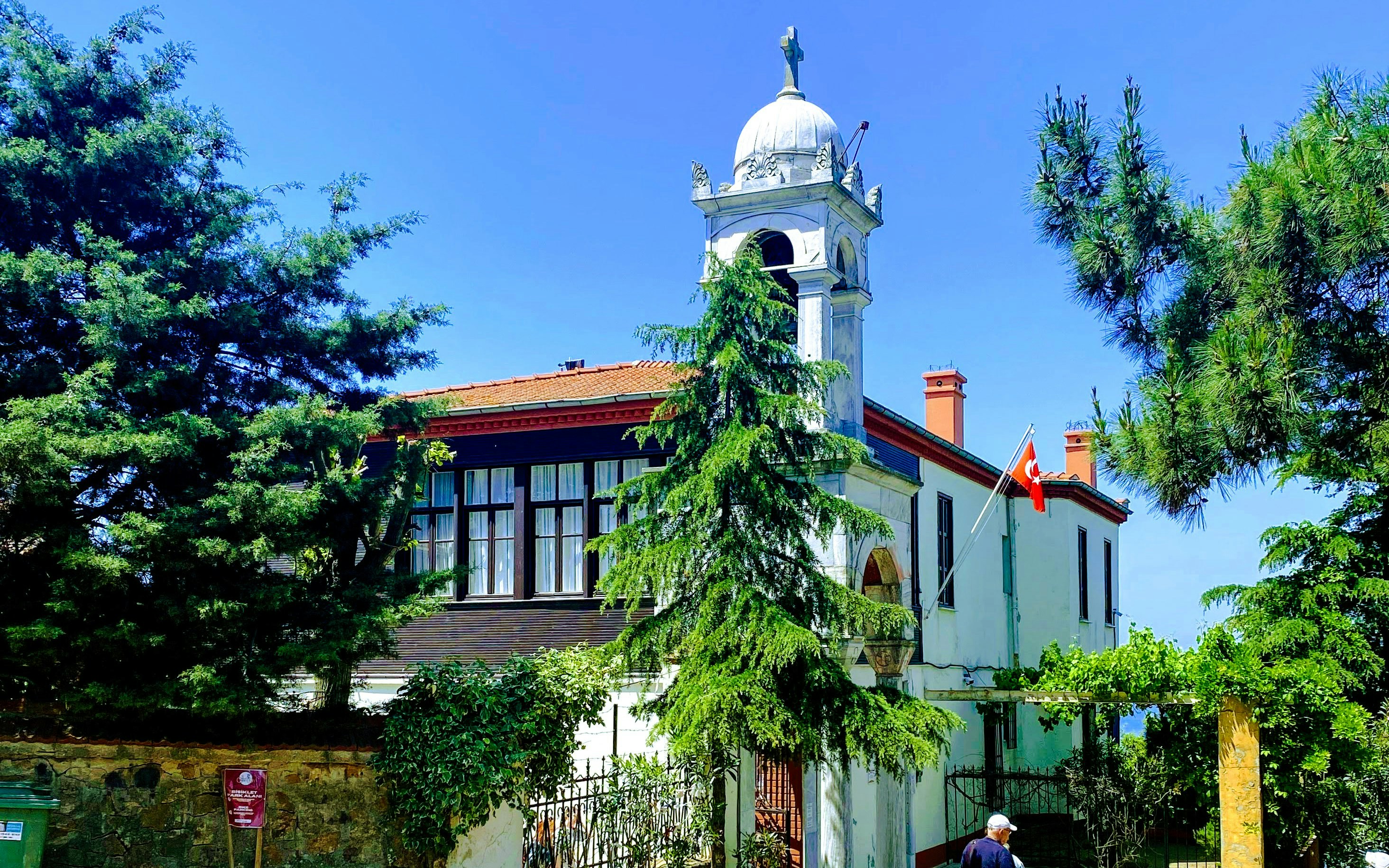 Aya Yorgi Church with bell tower and Turkish flag, Princes Island, Istanbul.