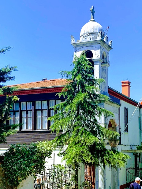 Aya Yorgi Church with bell tower and Turkish flag, Princes Island, Istanbul.