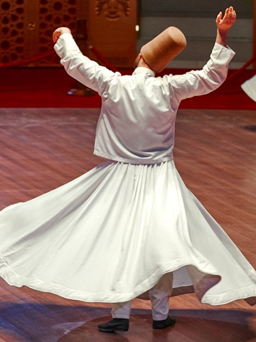 Whirling Dervish performing traditional dance in Turkey.