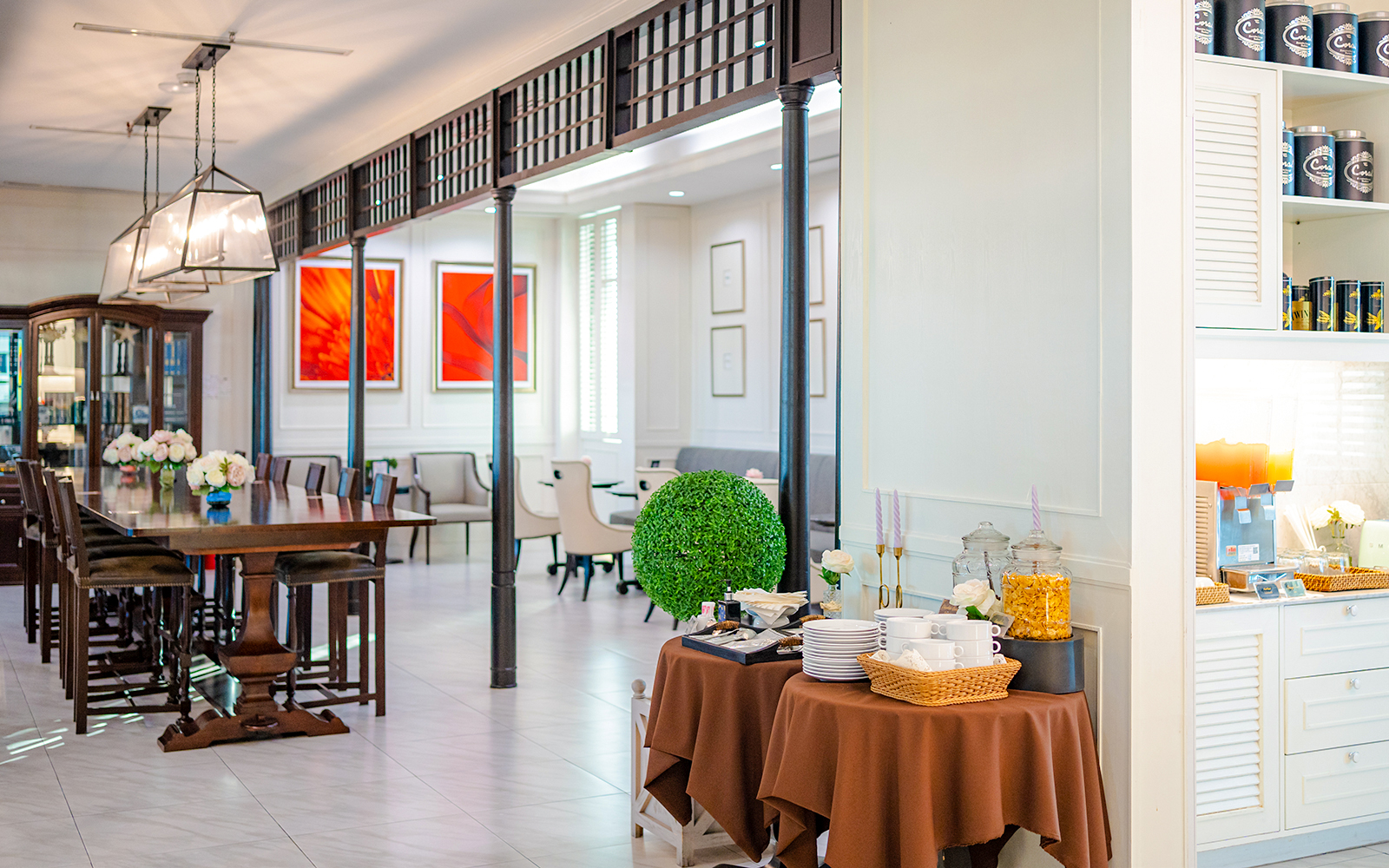 Dining area at The Coral Executive Lounge, Bangkok Airport, featuring a buffet setup.