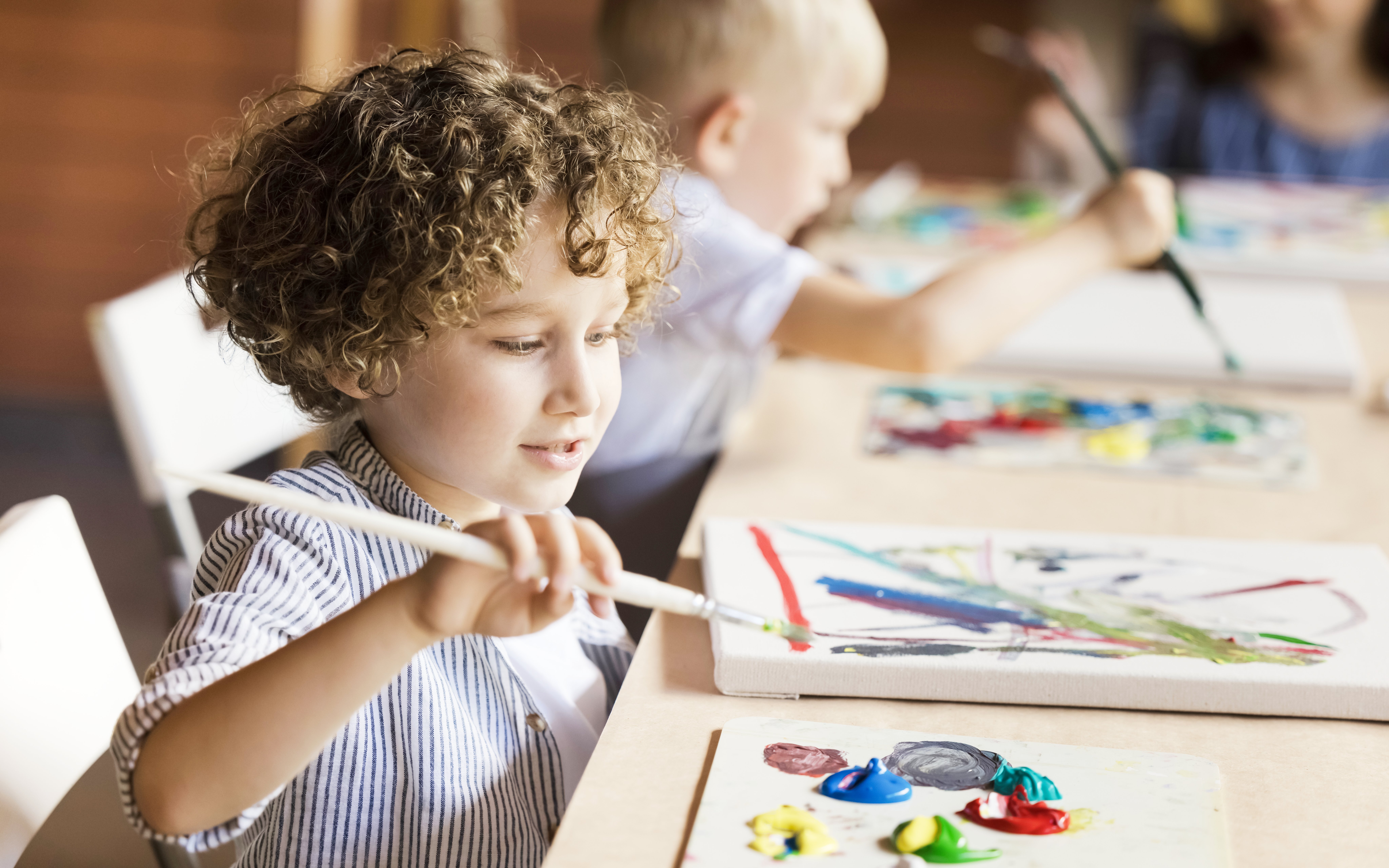 A child playing at Scribblescape, Dopamine Land, Dubai