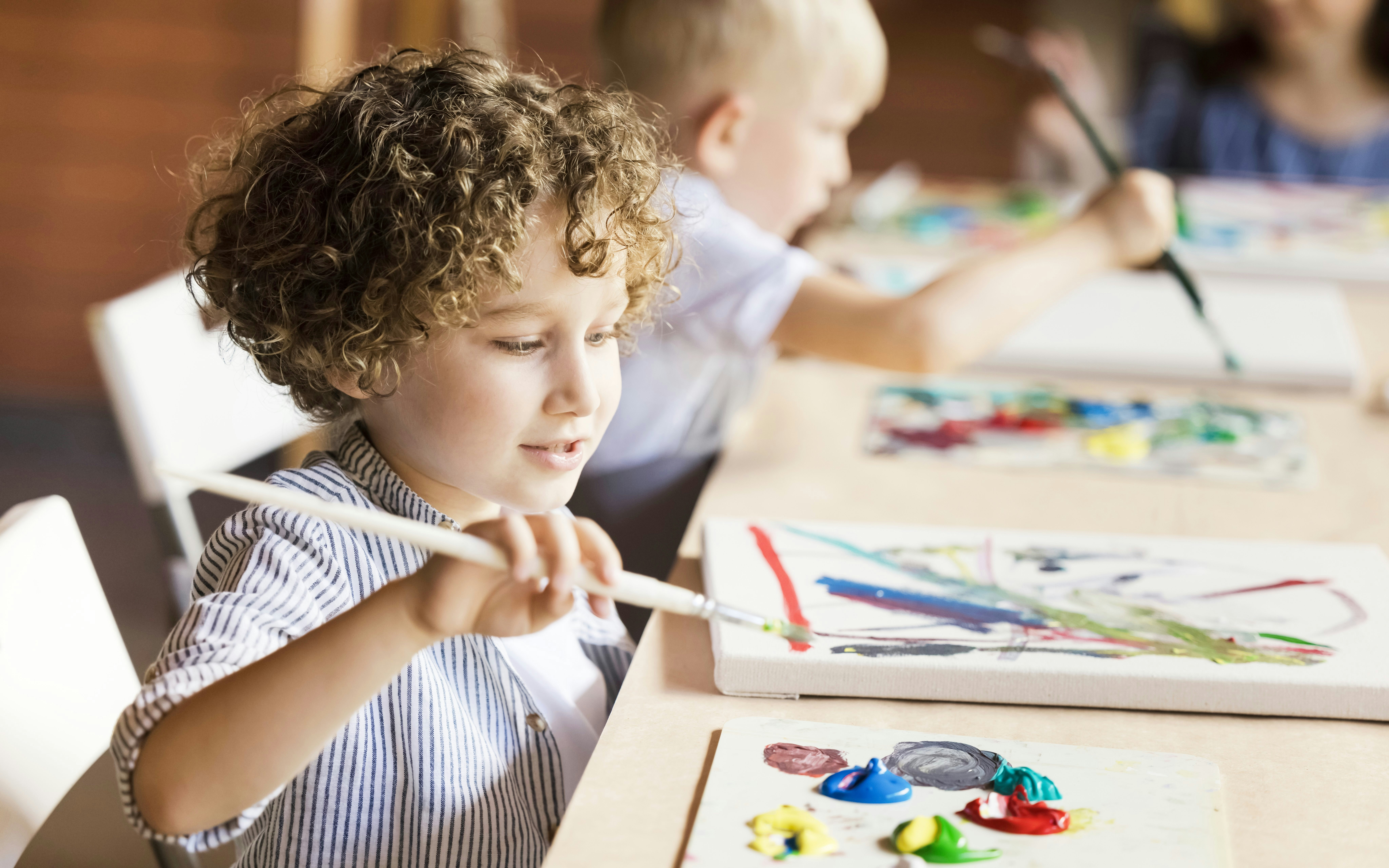 A child playing at Scribblescape, Dopamine Land, Dubai