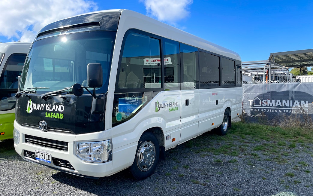 Bruny Island Safaris tour bus parked in Hobart for Bruny Island full-day guided tour.