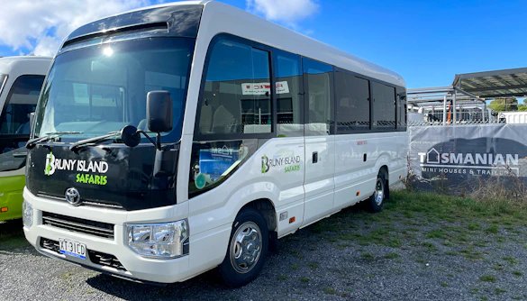 Bruny Island Safaris tour bus parked in Hobart for Bruny Island full-day guided tour.