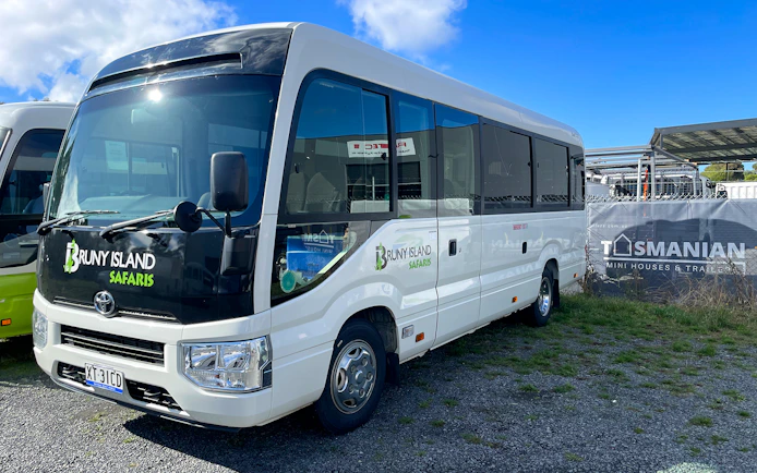 Bruny Island Safaris tour bus parked in Hobart for Bruny Island full-day guided tour.