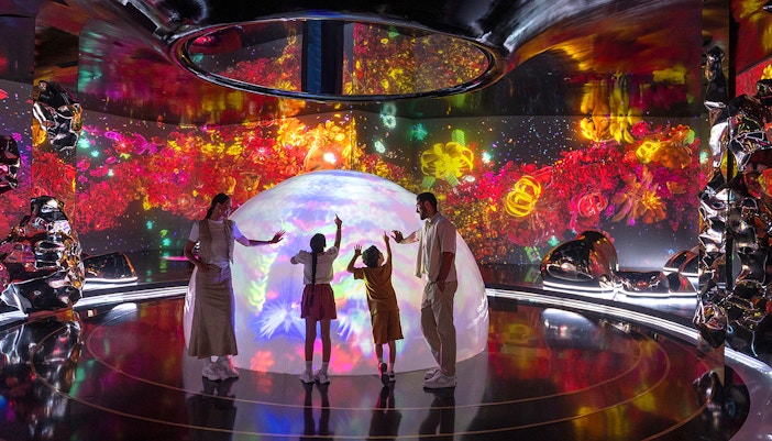 Family exploring The Source installation at AYA Universe, Dubai.