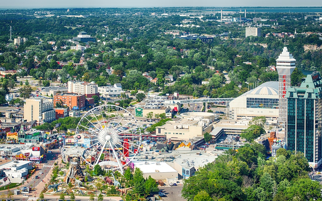 Aerial view of Clifton Hill, Ontario, featuring a Ferris wheel and surrounding attractions.