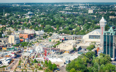 Aerial view of Clifton Hill, Ontario, featuring a Ferris wheel and surrounding attractions.