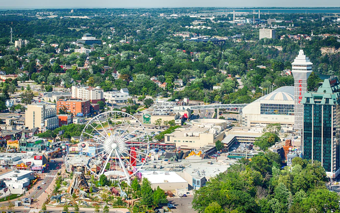 Aerial view of Clifton Hill, Ontario, featuring a Ferris wheel and surrounding attractions.