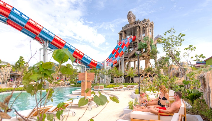 Andamanda Phuket Emerald Forest water park with lush greenery and winding water slides.