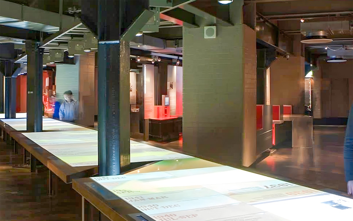 Interactive exhibit in Churchill War Rooms, London, showcasing historical documents.