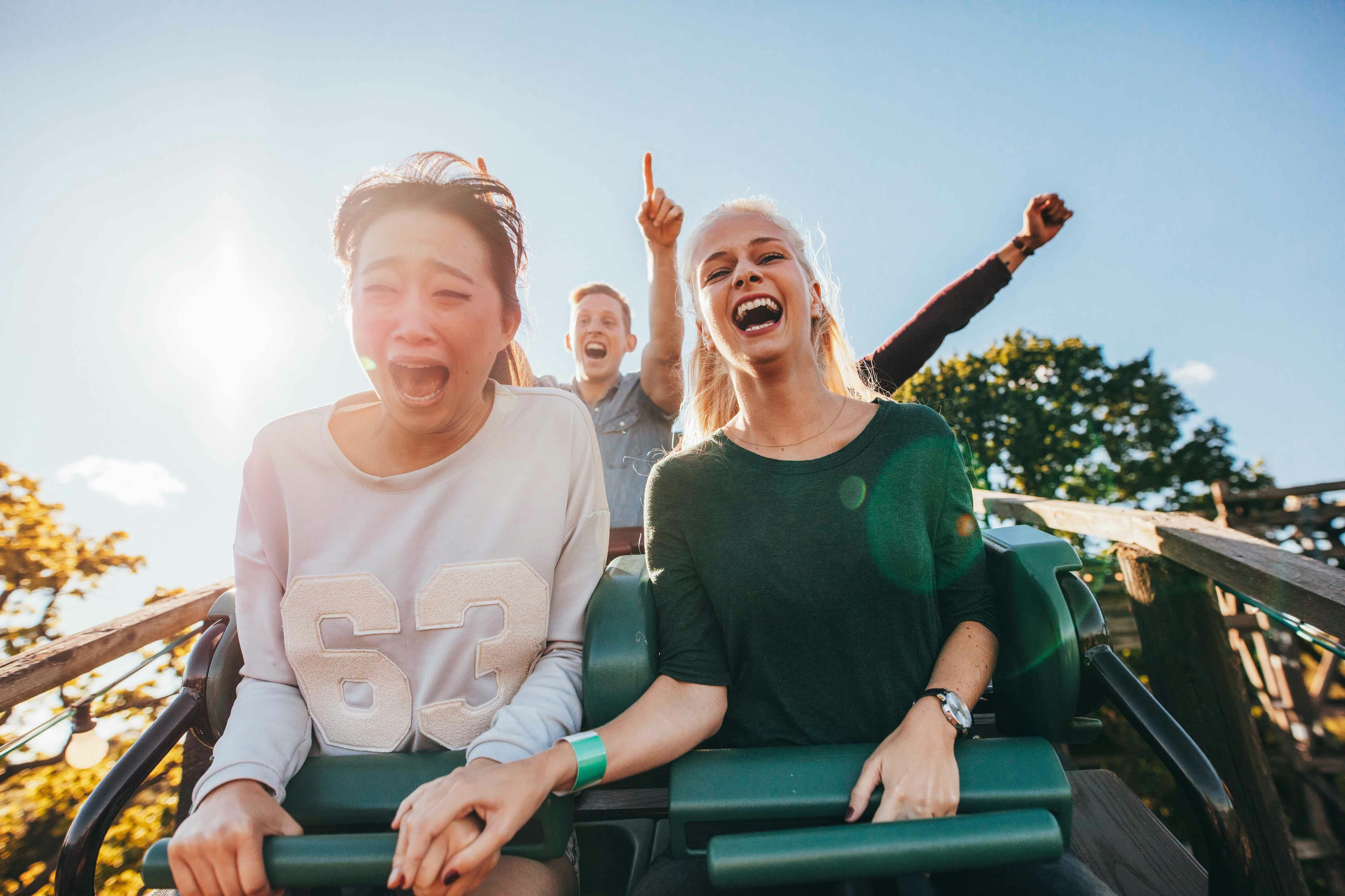 Visitors enjoying a roller coaster ride at Belantis Leipzig.