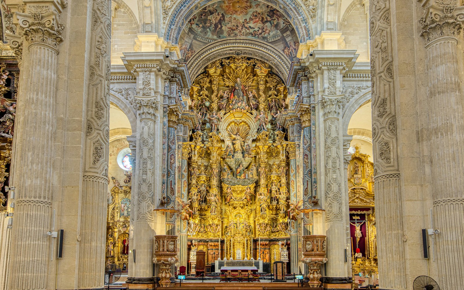 Seville Cathedral ornate altar with intricate carvings and golden details.
