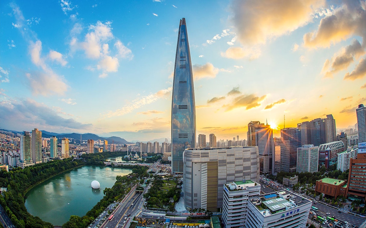 Lotte World Tower and Seoul skyline at sunset, South Korea.