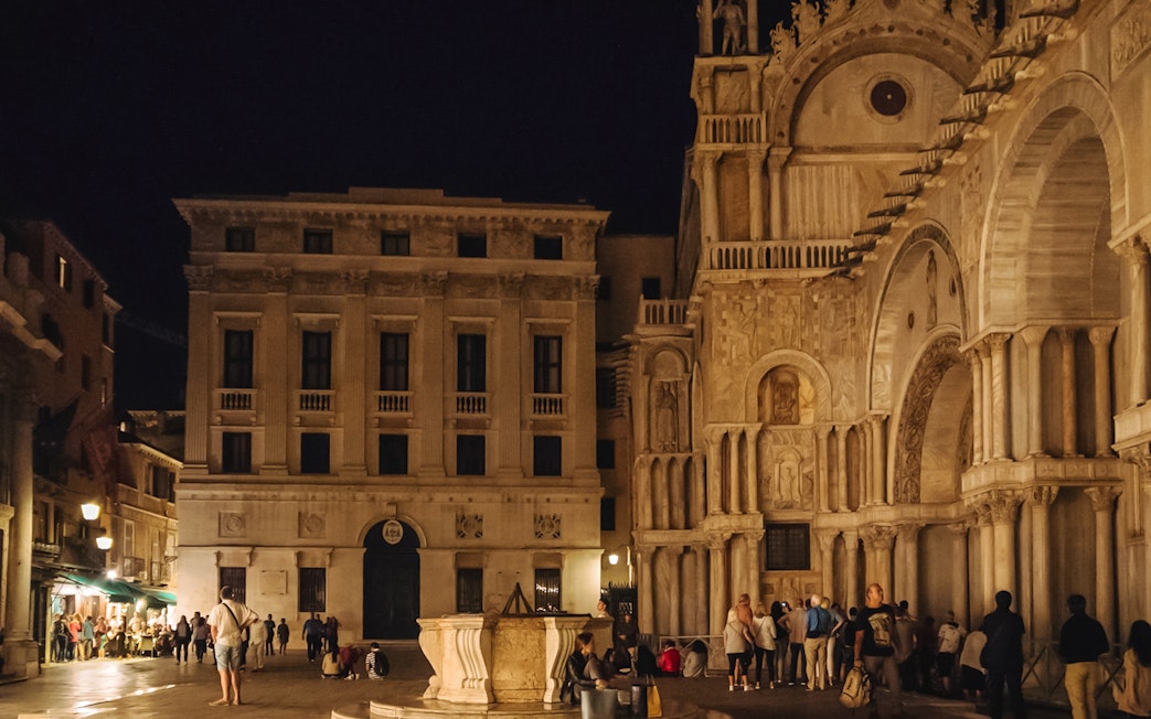 St. Mark's Basilica exterior at night during exclusive after-hours tour in Venice.