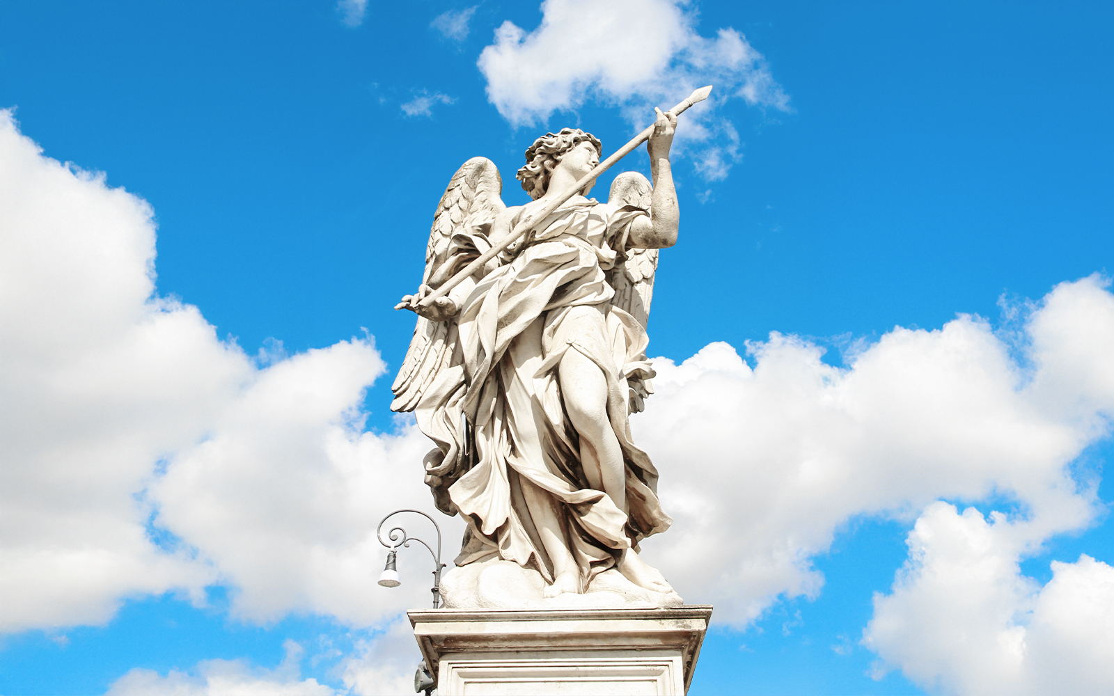 Angel sculpture by Domenico Guidi holding a lance at Castel Sant'Angelo, Rome, Italy.