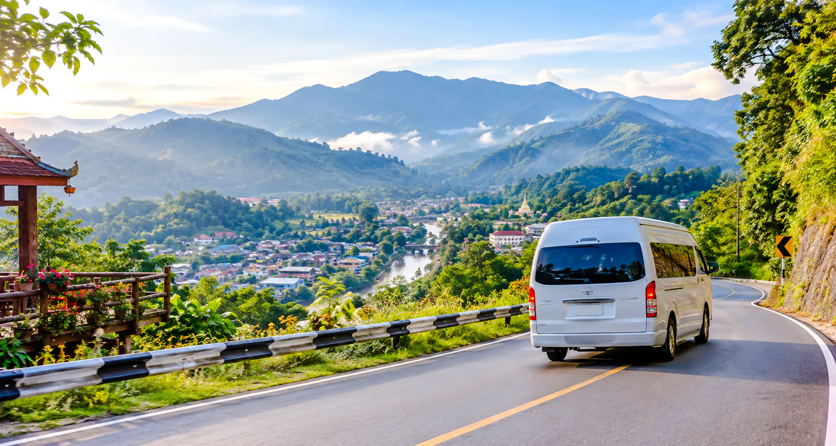 Private van on a scenic mountain road from Chiang Mai to Mae Hong Son Town.