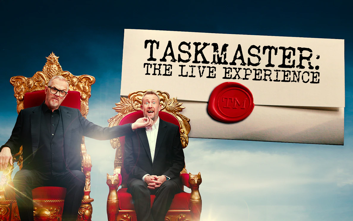 Taskmasters the Live Experience promotional image with two men on ornate chairs