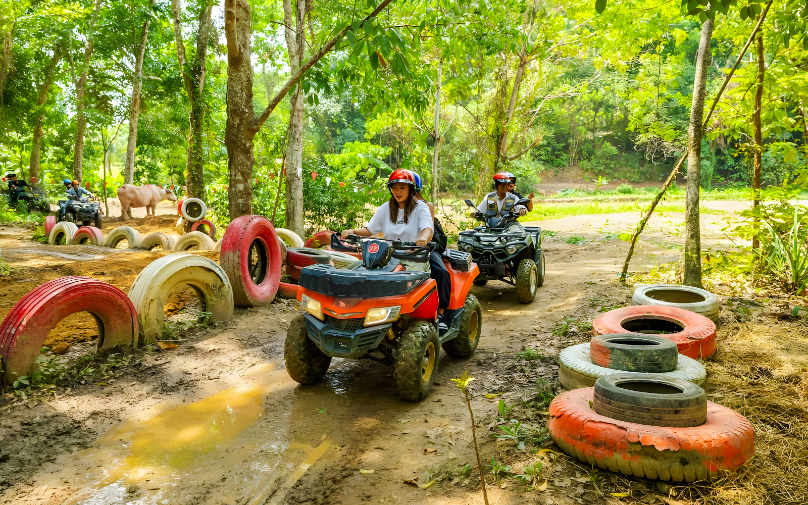 Quad biking through forest trail at Flying Hanuman, Phuket.