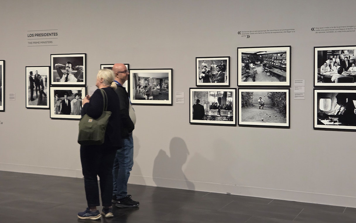 Tourists viewing photo exhibition at the Russian Museum.