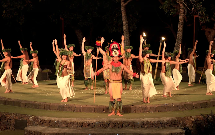 Traditional Hawaiian dancers performing at Old Lahaina Luau in Maui.