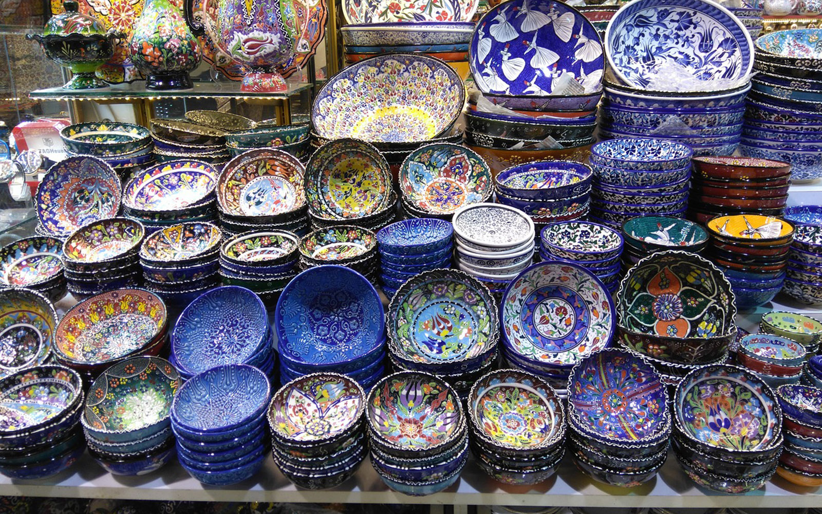 Grand Bazaar with colorful lanterns and bustling market stalls.
