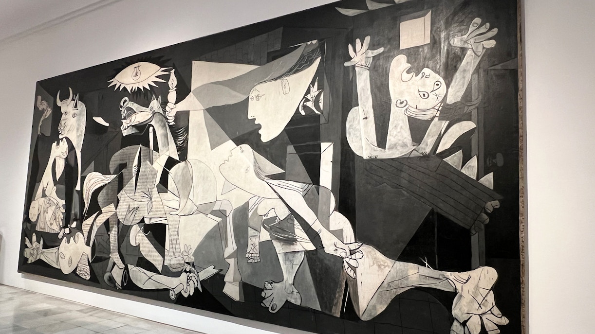 Pablo Picasso's Guernica with visitors at Reina Sofia Museum, Madrid.