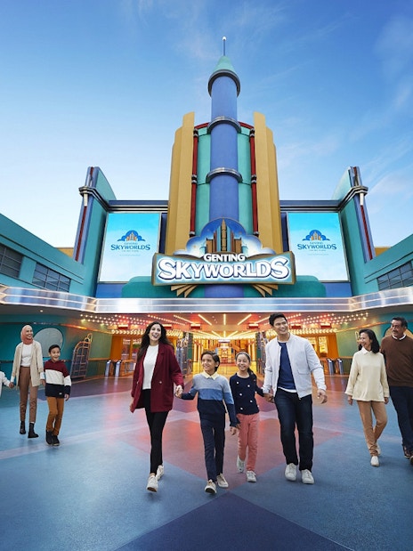 Visitors walking at the entrance of Genting SkyWorlds theme park.